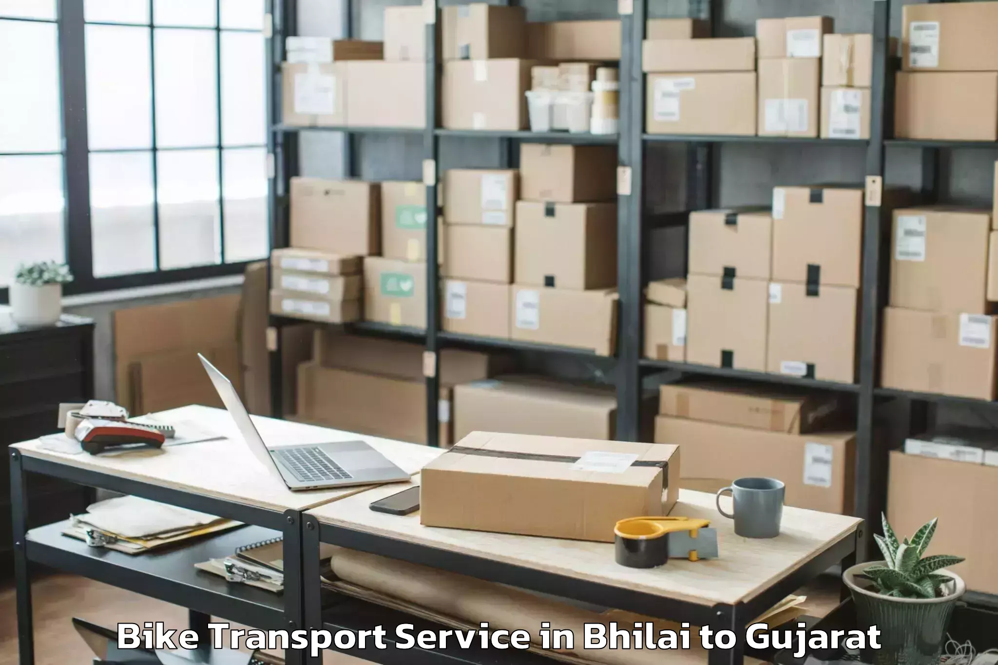 Get Bhilai to Marwadi University Rajkot Bike Transport